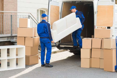 Moving team loading furniture safely in Brixton