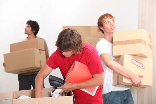 Packing boxes and household items for a Brixton move