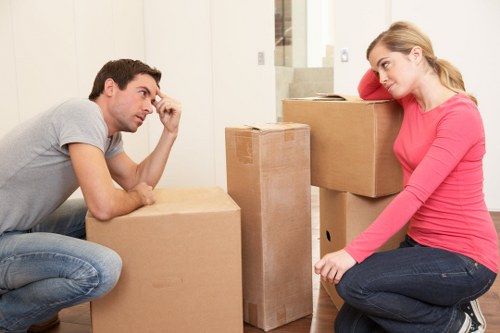 Unpacking and organising belongings in a Brixton home