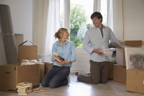 Moving boxes arranged in a Brixton flat after unpacking