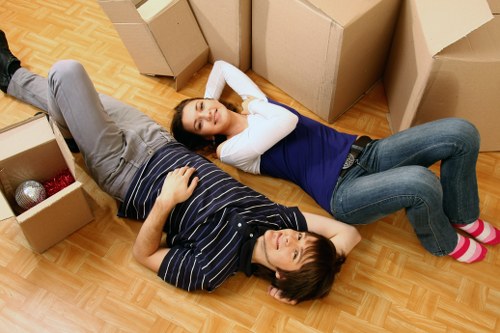 Furniture and boxes being loaded into a van for a Brixton removal job