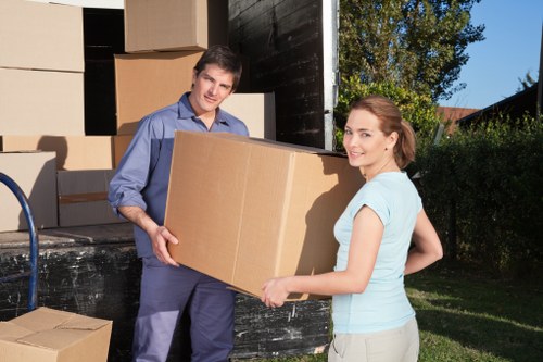 Van with man handling furniture during a scheduled move